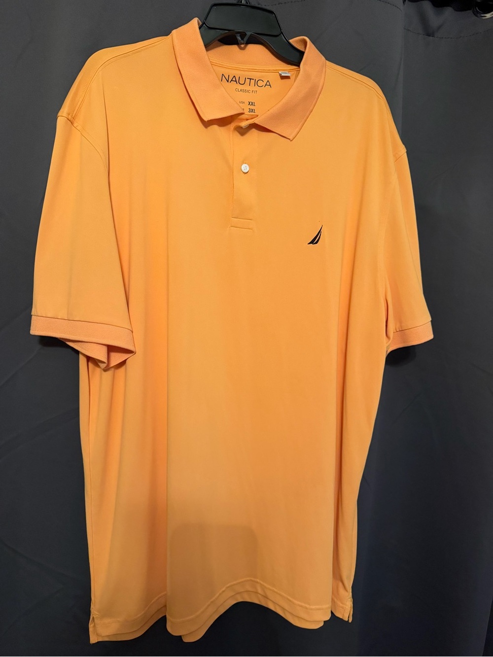 Nautica Men’s Peach-Orange Polo with Sail Logo